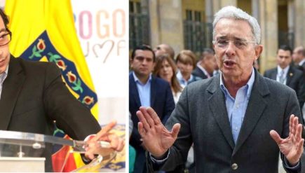 Not the best of friends: Gustavo Petro, left, and Alvaro Uribe speak while Ivan Duque looks on. Colombia president election Segunda Vuelta