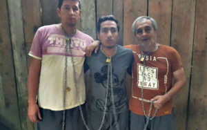 A screengrab from the video released by the FARC splinter group, showing, from left: photographer Paul Rivas, reporter Javier Ortega, and their driver, Efraín Segarra. Colombia